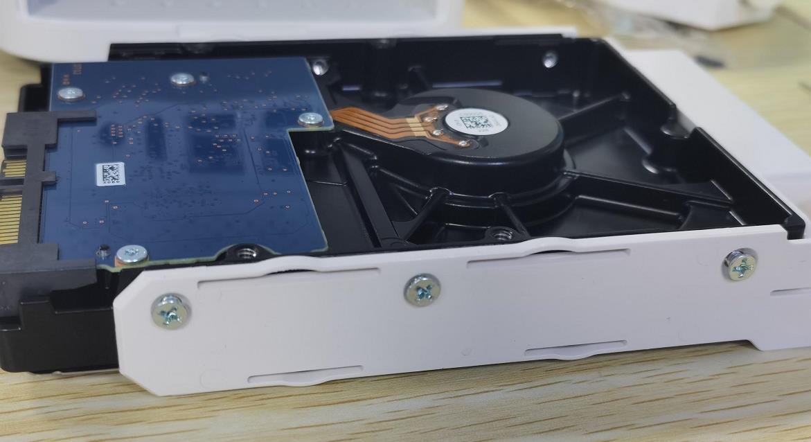 Use screws to secure the slot and the HDD